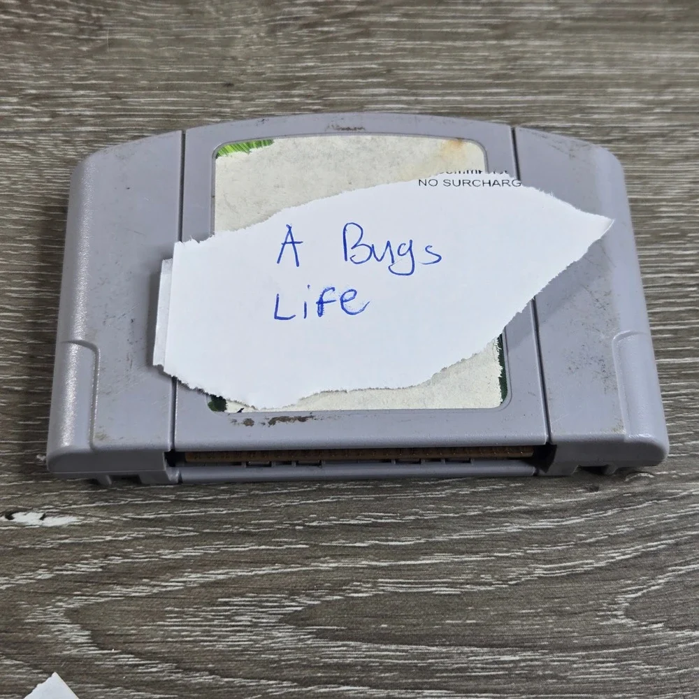 Nintendo NUS-006 A Bug's Life Video Game N64 Gray Blockbuster Label Tested